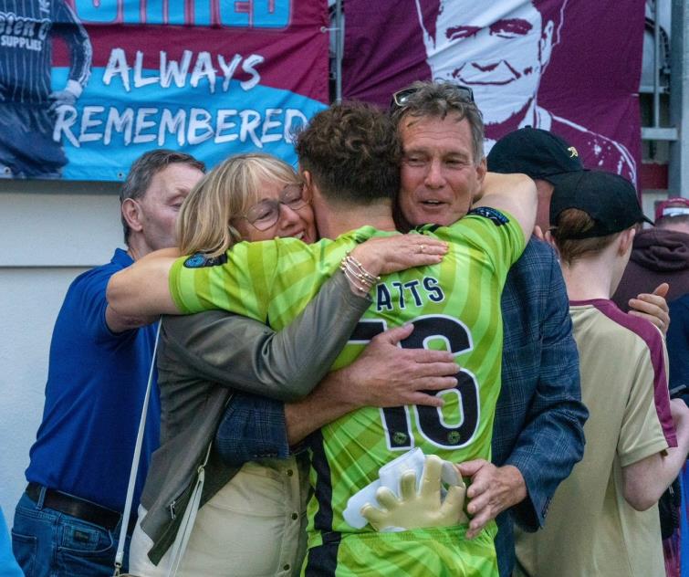 Evan with proud parents Debbie and Neil